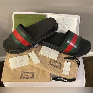 Authentic Gucci Men’s Web rubber slide sandal.